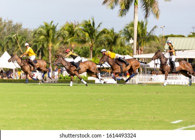 Wellington, Florida/USA - January 12, 2020: Joe Barry Cup Final at International Polo Club. Polo jockeys on horseback playing on the 300 yards long field.