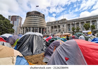 Wellington, New Zealand - February 20 2022: Wellington Covid-19 Convoy Protest Horde Of Tents In Front Of Beehive