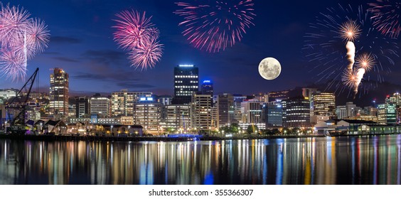 Wellington Water Front New Year Celebration..
Beautiful Cityscape, Full Moon And Fireworks.