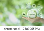 Wellness concept. Health, mindfulness, mental health, happiness, financial stability and growth icons on green natural background. Balance and integration in achieving overall wellbeing