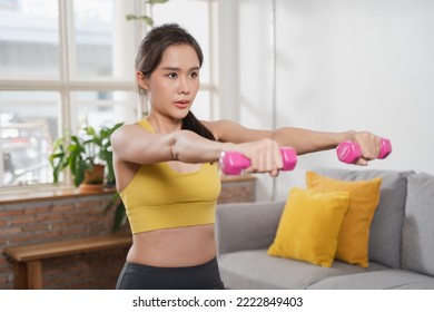 Wellness Healthy Lifestyles, Cheerful Asian Woman Lifting Weight And Body Care Exercise During Stay Home