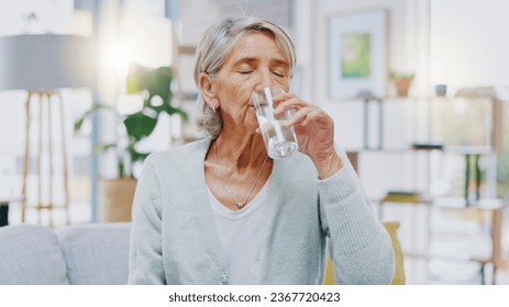 Wellness, home or healthy old woman drinking water for healthcare or natural vitamins in a house. Retirement, elderly relaxing or thirsty senior person refreshing with liquid for energy or hydration - Powered by Shutterstock