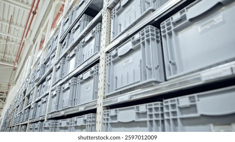 A WellOrganized and Efficient Warehouse Featuring Neatly Stacked Plastic Storage Bins