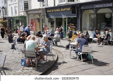 Wells, UK - August 20, 2020: People Dine Out At Street Side Restaurants. The Government Backed Eat Out To Help Out Scheme Has Boosted The Hospitality Industry In The Wake Of The Covid-19 Pandemic.