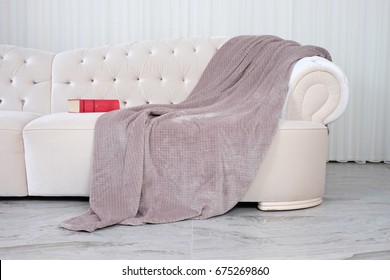 Wellsoft Throw Blanket On The White Sofa