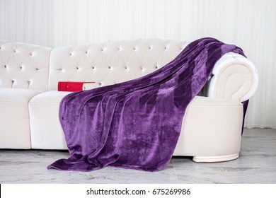 Wellsoft Throw Blanket On The White Sofa