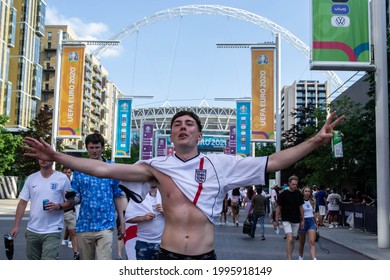WEMBLEY, LONDON, ENGLAND- 13 June 2021: Triumphant England football fan after England's win against Croatia in the EUROS game at Wembley