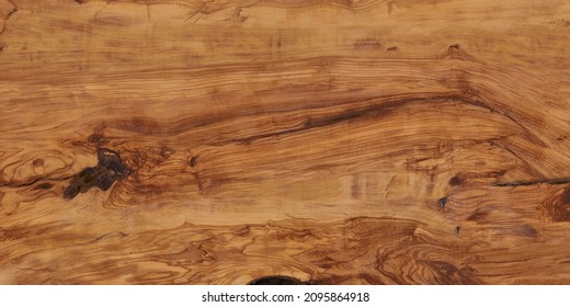 wenge oak, a flat surface of natural wood with a rich close-up pattern. plywood textured wooden background or wood surface of the old at grunge dark grain wall texture of panel top view. Vintage teak.
