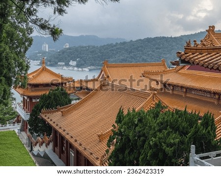 Wenwu temple roof and Sun moon lake at twilight, Taiwan.