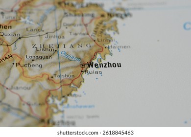 Wenzhou, Zhejiang, China, photo of a world atlas map, suitable to illustrate, travel, tourism, trade, economy and politics topics