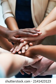 Were All Part Of The Team. Shot Of A Group Of People Putting Their Hands Together.