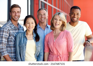 Were All In It Together. Portrait Of A Diverse Group Of Coworkers In A Casual Office Environment.