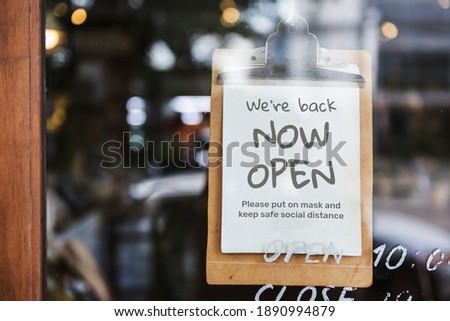 We're back, now open cafe sign after covid-19 pandemic