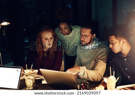 Were committed to completing prioritised tasks. Cropped shot of a group of young people working late in the office.