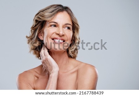 Were happier when we feel good about ourselves. Shot of a beautiful mature woman posing against a white background.