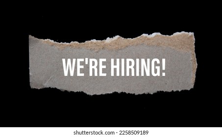 we're hiring! written on torn paper. Business concept photo. - Shutterstock ID 2258509189
