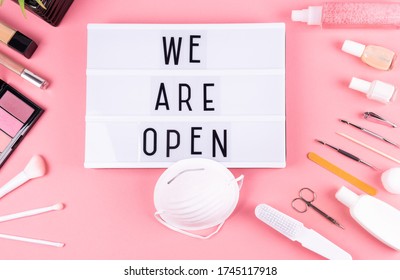 We're Open. Reopening Of Beauty Salon, Nail Salon, Cosmetics Store Concept. 
We're Open.