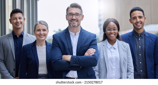 Were The Team You Need. Cropped Portrait Of A Group Of Corporate Businesspeople Standing Outside With Their Arms Folded.