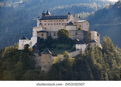 Werfen Castle, located in Austria's Salzburger Land, stands as a towering historical monument against a backdrop of spectacular alpine scenery.  - Powered by Shutterstock