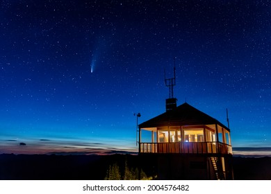 Werner Peak Fire Lookout Tower with NEOWISE comet in the Stillwater State Forest near Whitefish, Montana, USA