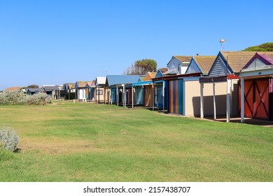 Werribee Sth, Vic Australia - March 3 2022: Row Of Brightly Coloured Boat Houses On The Shores Of Werribee South Beach