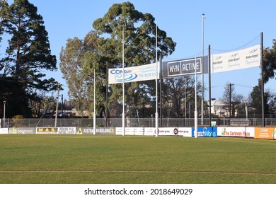 Werribee, Vic Australia - August 1 2021: AFL Football Oval Chirnside Park Werribee With Goal Posts And Sponsor Advertising