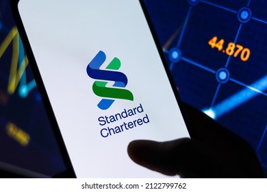 West Bangal, India - October 09, 2021 : Standard Chartered logo on phone screen stock image.