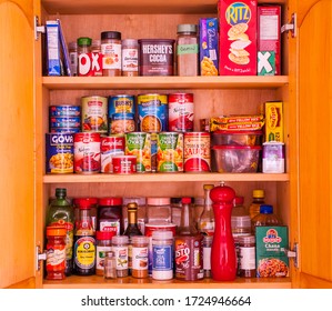 West Bay, Grand Cayman, Cayman Islands 05/07/2020. A well stocked cupboard. Consumers have just got past the panic buying for coronavirus but now need to prepare for an active hurricane season