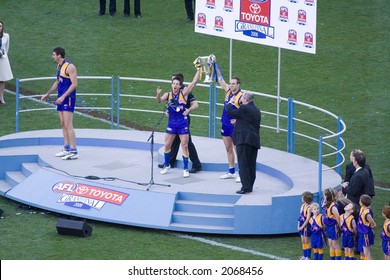 The West Coast Eagles Holding The Winning Cup Aloft At The 2006 AFL Grand Final