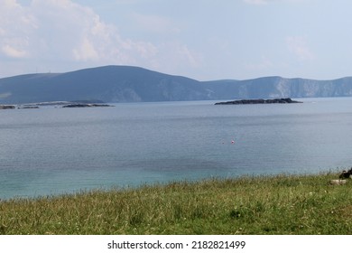 West Coast Of Ireland Landscape In Achill Island In County Mayo With Grass Sea Sand Beach Sheep