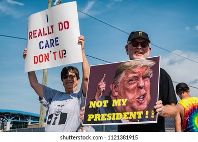West Columbia, South Carolina - June 25, 2018: Anti-Trump protesters protest the arrival of Donald Trump in West Columbia before his rally with South Carolina Governor Henry McMaster.