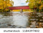 The West Cornwall Covered Bridge (also known as Hart Bridge) is a wooden covered bridge  built around 1864 over the  Housatonic River