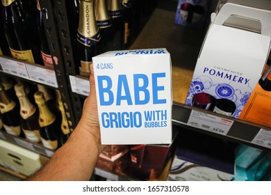 West Covina, California/United States - 02/19/2020: A Hand Holds A Case Of Babe Grigio With Bubbles, Which Is A Canned Wine Product.