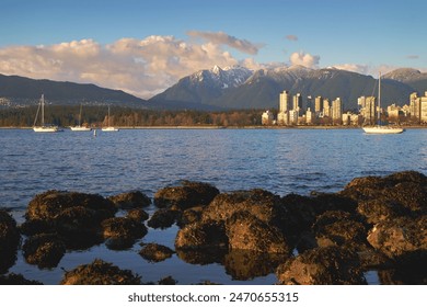   West End Afternoon Serene English Bay. Sailboats anchored in English Bay. In the background are the snowcapped North Shore Mountains. Vancouver, British Columbia, Canad
                              - Powered by Shutterstock