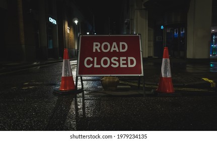 West End, London - 26th March 2021 - A 'No Entry' Block Access Into A Road In London's West End At Night