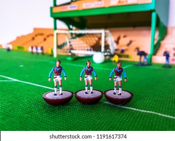 West Ham Subbuteo Football Figures Lined Up On A Grass Field