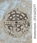 West Haven manhole cover at the beach 