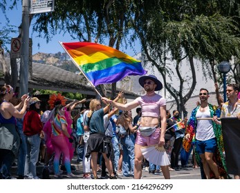 West Hollywood, CA - June 5, 2022: Supporter With Flag At Pride Parade