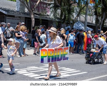 West Hollywood, CA - June 5, 2022: Supporter Holding Pride Sign At Pride Parade