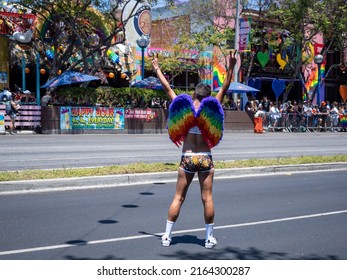 West Hollywood, CA - June 5, 2022: Supporter With Rainbow Angel Wings Pride Parade