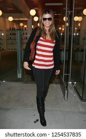 West Hollywood, CA, USA, 05-23-2007
Carmen Electra Out Shopping In A Red And White Striped Top.