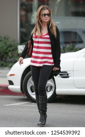 West Hollywood, CA, USA, 05-23-2007
Carmen Electra Out Shopping In A Striped Top.