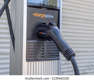 West Hollywood, CA, USA - March 26, 2022: Close Up Of Charge Point Cable At An Electric Vehicle Charging Station In West Hollywood, CA.