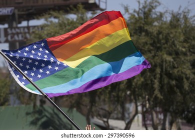 West Hollywood, Los Angeles, California, USA, June 14, 2015, 40th Annual Gay Pride Parade For LGBT Community, Down Santa Monica Blvd., Rainbow Gay American Flag Flies