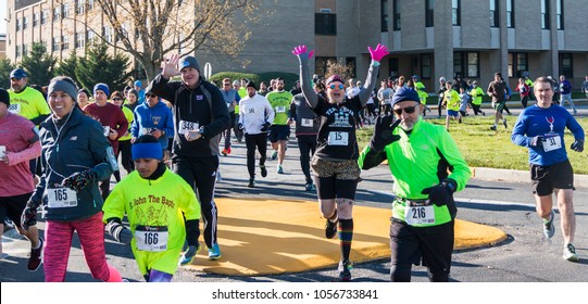 West Islip, NY, USA - 24 November 2017: Runners Wave To The Camera At The Start Of The Run Your Turkey Off 4K Race, The Day After Thanksgiving.