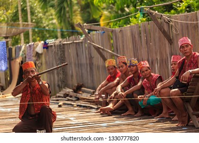 West Kalimantan / Indonesia - December 11, 2015 : 
Spectacular Borneo Sumpit, Blowgun / Blowpipe Hunting Spear. Traditional Weapon Consisting Of A Small Wooden Tube For Firing Light Projectiles /dart