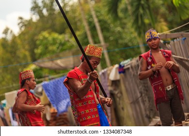 West Kalimantan / Indonesia - December 11, 2015 : 
Spectacular Borneo Sumpit, Blowgun / Blowpipe Hunting Spear. Traditional Weapon Consisting Of A Small Wooden Tube For Firing Light Projectiles / Dart