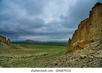 West Kazakhstan. In The Boundless Steppe There Is A Lonely Mountain Complex Shirkala, Which From A Distance Looks Like A Yurt.