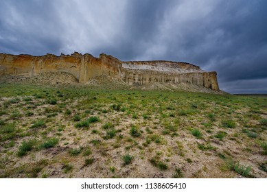 West Kazakhstan. In The Boundless Steppe There Is A Lonely Mountain Complex Shirkala, Which From A Distance Looks Like A Yurt.