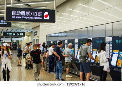 WEST KOWLOON, HONG KONG - SEP 29, 2018: Passenger Queuing At The Automatic Ticket Vending Machine At The West Kowloon High Speed Rail Station For High Speed Rail Tickets To China